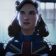 Captain Peggy Carter standing in a beam of light, as one does.